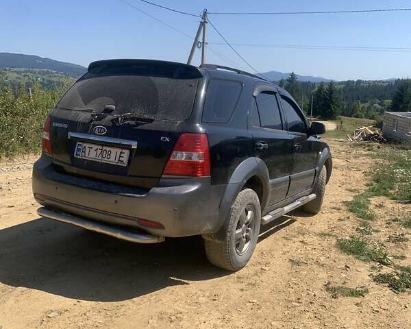 Черный Киа Соренто, объемом двигателя 2.5 л и пробегом 300 тыс. км за 7300 $, фото 5 на Automoto.ua