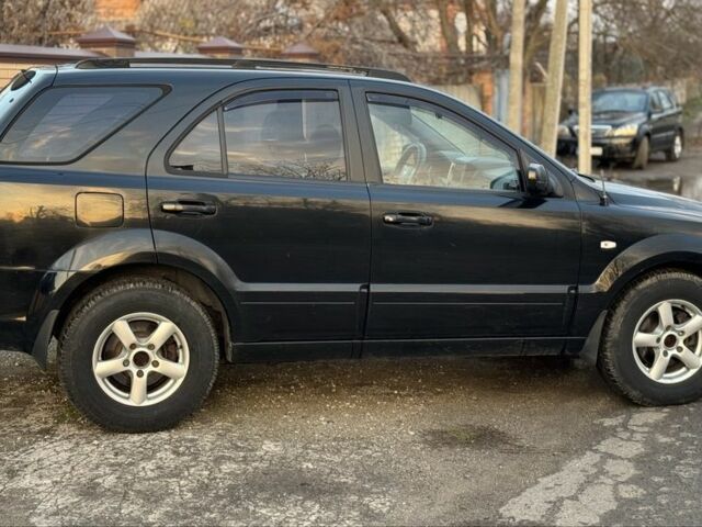 Черный Киа Соренто, объемом двигателя 2.5 л и пробегом 290 тыс. км за 5200 $, фото 7 на Automoto.ua