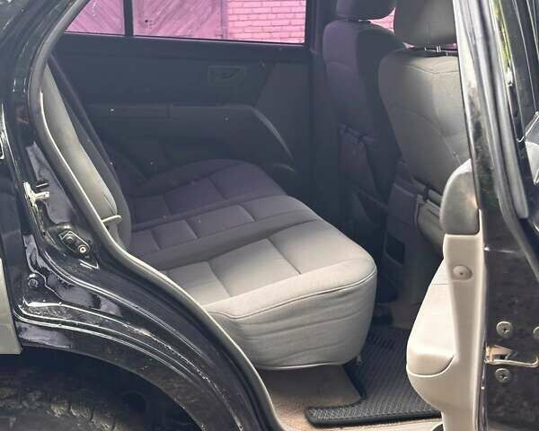 Чорний Кіа Соренто, об'ємом двигуна 2.5 л та пробігом 256 тис. км за 8500 $, фото 26 на Automoto.ua