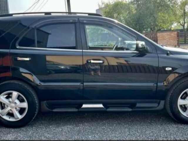 Черный Киа Соренто, объемом двигателя 2.5 л и пробегом 269 тыс. км за 6250 $, фото 2 на Automoto.ua