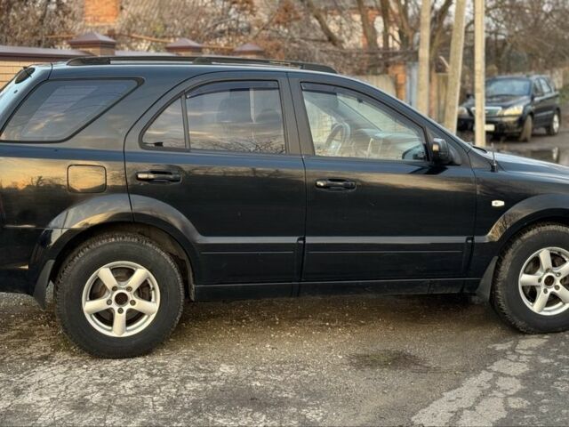 Черный Киа Соренто, объемом двигателя 2.5 л и пробегом 290 тыс. км за 5200 $, фото 6 на Automoto.ua