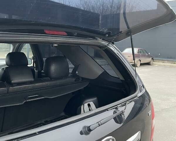 Черный Киа Соренто, объемом двигателя 2.5 л и пробегом 203 тыс. км за 8700 $, фото 13 на Automoto.ua