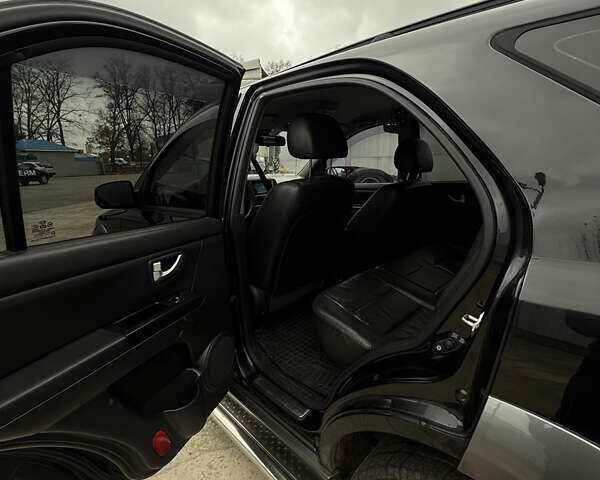 Черный Киа Соренто, объемом двигателя 2.5 л и пробегом 182 тыс. км за 8400 $, фото 8 на Automoto.ua