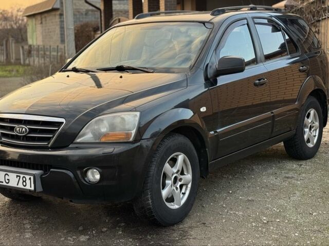 Черный Киа Соренто, объемом двигателя 2.5 л и пробегом 290 тыс. км за 5200 $, фото 2 на Automoto.ua