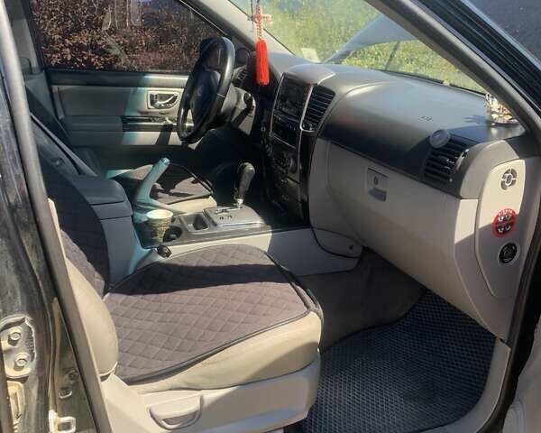 Черный Киа Соренто, объемом двигателя 2.5 л и пробегом 300 тыс. км за 7300 $, фото 3 на Automoto.ua