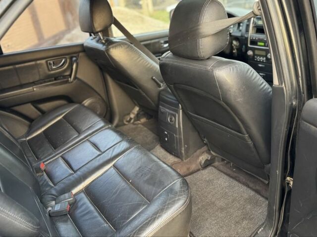 Черный Киа Соренто, объемом двигателя 2.5 л и пробегом 290 тыс. км за 5200 $, фото 13 на Automoto.ua