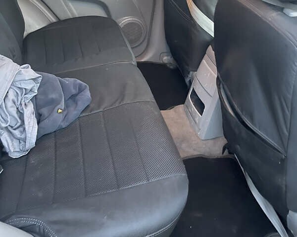 Черный Киа Соренто, объемом двигателя 2.5 л и пробегом 300 тыс. км за 8700 $, фото 5 на Automoto.ua