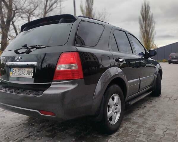 Черный Киа Соренто, объемом двигателя 2.5 л и пробегом 213 тыс. км за 8500 $, фото 5 на Automoto.ua