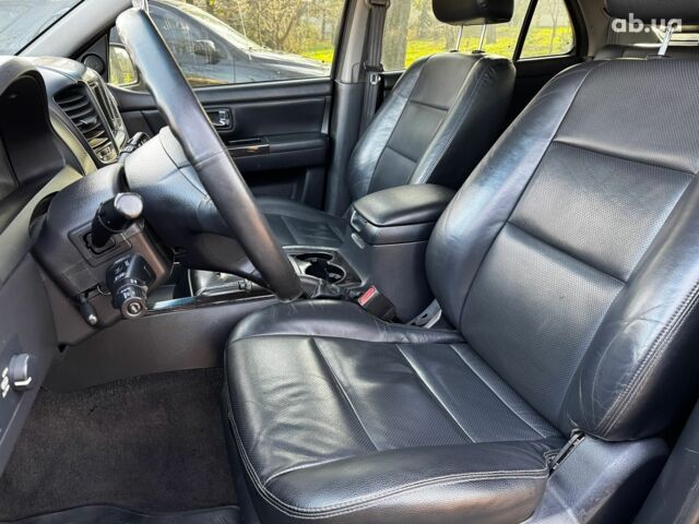 Черный Киа Соренто, объемом двигателя 2.5 л и пробегом 140 тыс. км за 8190 $, фото 17 на Automoto.ua