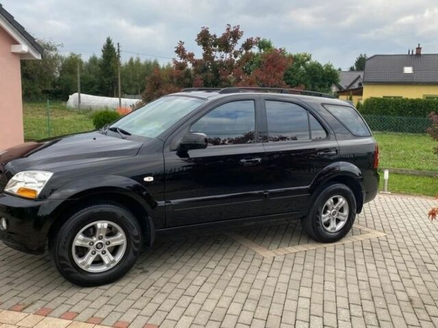 Черный Киа Соренто, объемом двигателя 2.5 л и пробегом 246 тыс. км за 3800 $, фото 1 на Automoto.ua