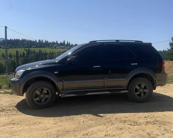 Черный Киа Соренто, объемом двигателя 2.5 л и пробегом 300 тыс. км за 7300 $, фото 1 на Automoto.ua