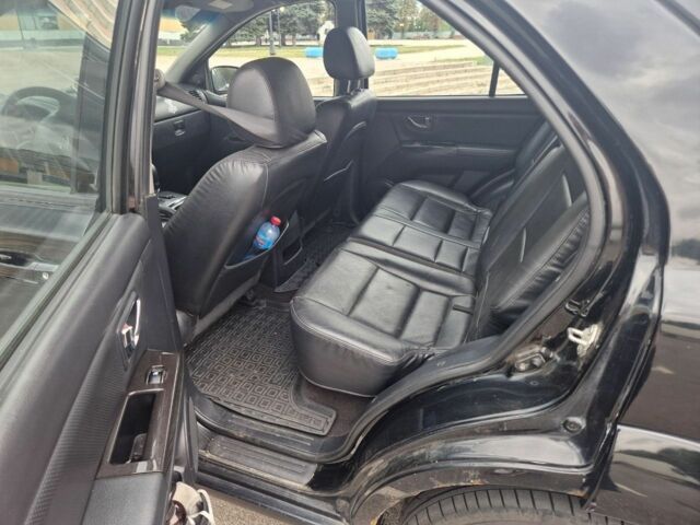 Черный Киа Соренто, объемом двигателя 2.5 л и пробегом 250 тыс. км за 5500 $, фото 4 на Automoto.ua