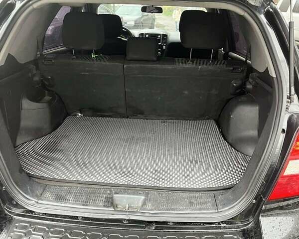 Чорний Кіа Соренто, об'ємом двигуна 2.5 л та пробігом 242 тис. км за 7400 $, фото 16 на Automoto.ua