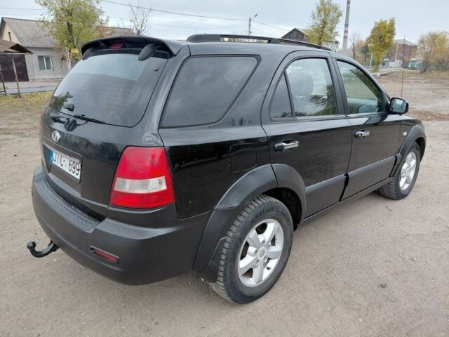 Черный Киа Соренто, объемом двигателя 2.5 л и пробегом 250 тыс. км за 3600 $, фото 5 на Automoto.ua