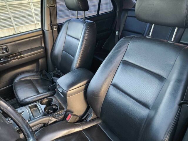 Черный Киа Соренто, объемом двигателя 2.5 л и пробегом 180 тыс. км за 1387 $, фото 14 на Automoto.ua