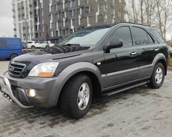 Черный Киа Соренто, объемом двигателя 2.5 л и пробегом 213 тыс. км за 8500 $, фото 1 на Automoto.ua