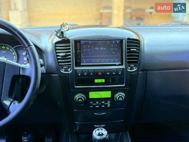 Черный Киа Соренто, объемом двигателя 2.5 л и пробегом 208 тыс. км за 8200 $, фото 57 на Automoto.ua