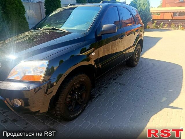 Черный Киа Соренто, объемом двигателя 2.5 л и пробегом 370 тыс. км за 4000 $, фото 1 на Automoto.ua