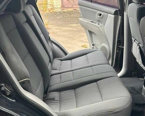 Чорний Кіа Соренто, об'ємом двигуна 2.5 л та пробігом 256 тис. км за 8500 $, фото 29 на Automoto.ua