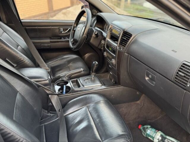 Черный Киа Соренто, объемом двигателя 2.5 л и пробегом 290 тыс. км за 5200 $, фото 11 на Automoto.ua