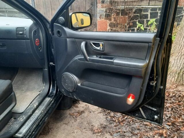 Черный Киа Соренто, объемом двигателя 2.5 л и пробегом 250 тыс. км за 4870 $, фото 15 на Automoto.ua