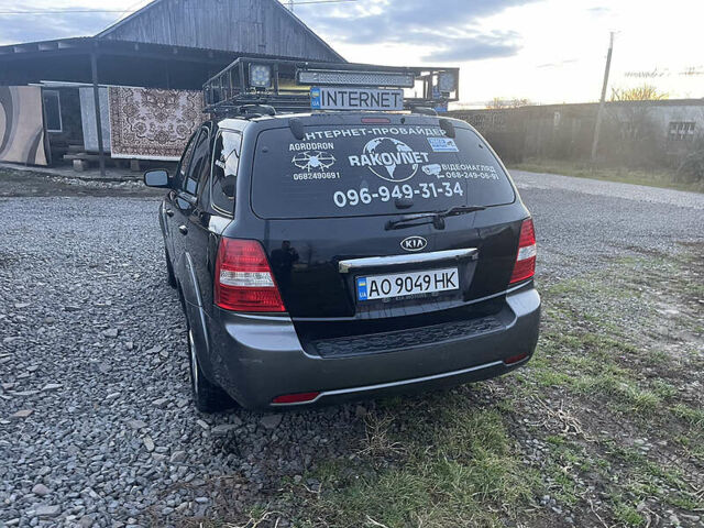 Черный Киа Соренто, объемом двигателя 2.5 л и пробегом 300 тыс. км за 8700 $, фото 2 на Automoto.ua