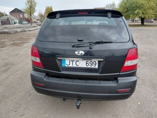 Черный Киа Соренто, объемом двигателя 2.5 л и пробегом 250 тыс. км за 3600 $, фото 4 на Automoto.ua