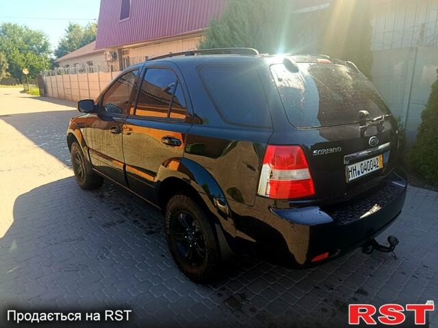 Черный Киа Соренто, объемом двигателя 2.5 л и пробегом 370 тыс. км за 4000 $, фото 2 на Automoto.ua