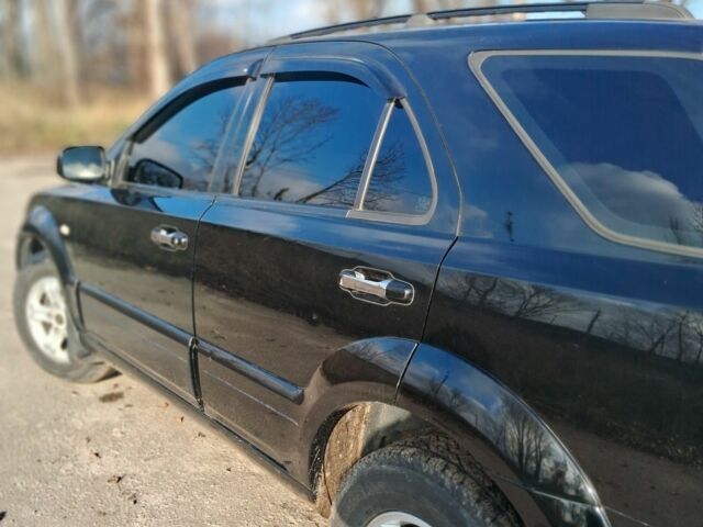 Чорний Кіа Соренто, об'ємом двигуна 2.5 л та пробігом 282 тис. км за 8450 $, фото 1 на Automoto.ua