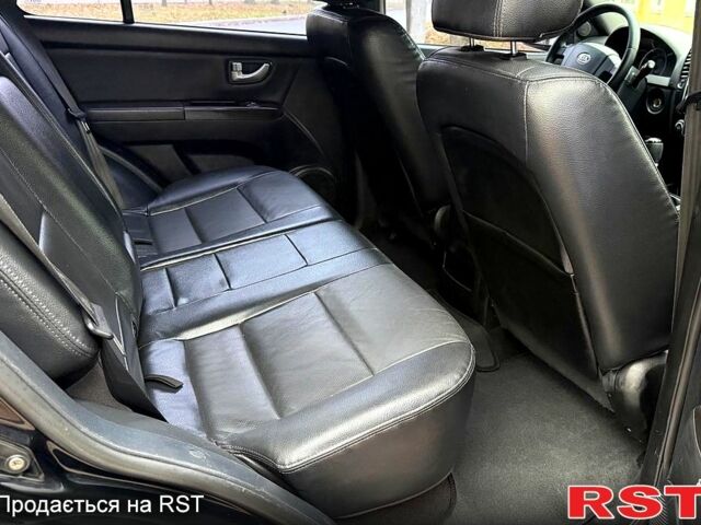 Черный Киа Соренто, объемом двигателя 2.5 л и пробегом 173 тыс. км за 9500 $, фото 11 на Automoto.ua