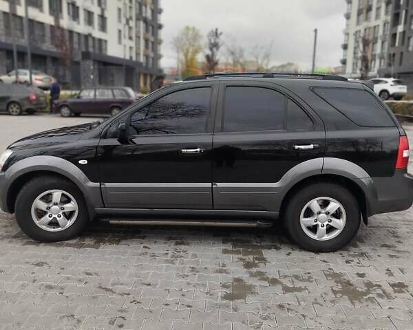 Черный Киа Соренто, объемом двигателя 2.5 л и пробегом 213 тыс. км за 8500 $, фото 2 на Automoto.ua