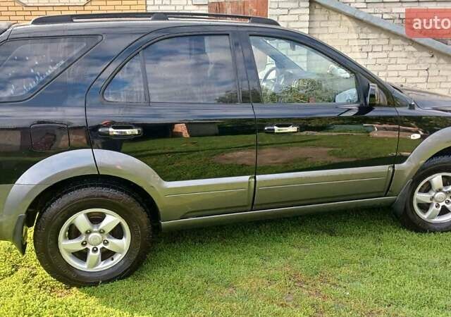 Черный Киа Соренто, объемом двигателя 2.5 л и пробегом 186 тыс. км за 8000 $, фото 2 на Automoto.ua