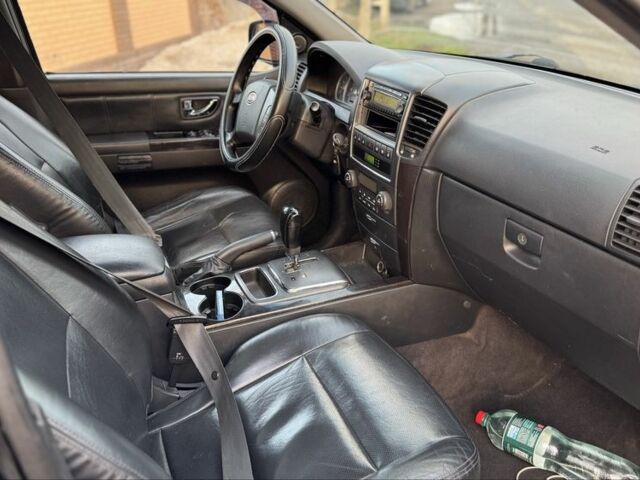 Черный Киа Соренто, объемом двигателя 2.5 л и пробегом 290 тыс. км за 5200 $, фото 12 на Automoto.ua