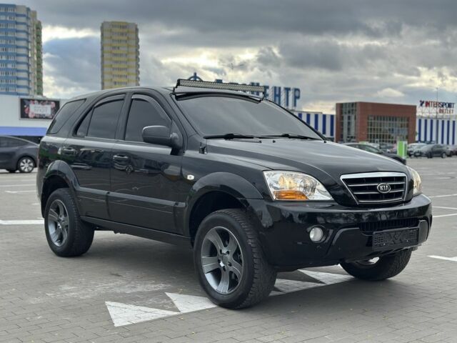Черный Киа Соренто, объемом двигателя 2.5 л и пробегом 300 тыс. км за 5399 $, фото 2 на Automoto.ua