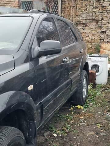 Черный Киа Соренто, объемом двигателя 2.5 л и пробегом 300 тыс. км за 4600 $, фото 2 на Automoto.ua