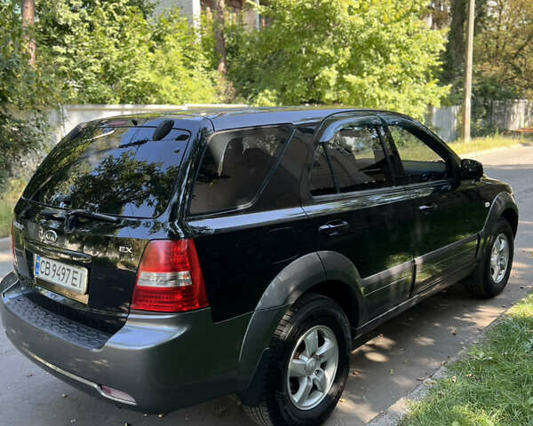 Черный Киа Соренто, объемом двигателя 2.5 л и пробегом 228 тыс. км за 9500 $, фото 12 на Automoto.ua