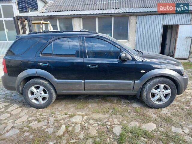 Черный Киа Соренто, объемом двигателя 2.5 л и пробегом 197 тыс. км за 10000 $, фото 8 на Automoto.ua