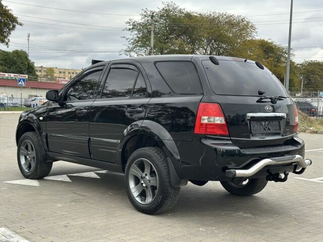 Черный Киа Соренто, объемом двигателя 2.5 л и пробегом 300 тыс. км за 5399 $, фото 5 на Automoto.ua