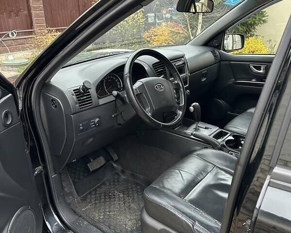 Черный Киа Соренто, объемом двигателя 2.5 л и пробегом 199 тыс. км за 10350 $, фото 6 на Automoto.ua