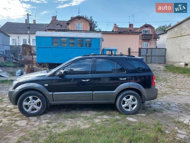 Черный Киа Соренто, объемом двигателя 2.5 л и пробегом 197 тыс. км за 10000 $, фото 13 на Automoto.ua