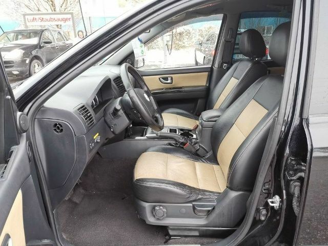 Чорний Кіа Соренто, об'ємом двигуна 2.5 л та пробігом 217 тис. км за 3600 $, фото 9 на Automoto.ua