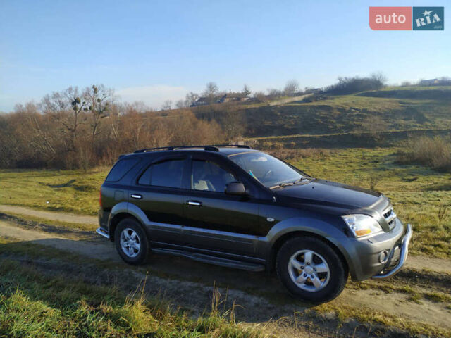 Чорний Кіа Соренто, об'ємом двигуна 2.5 л та пробігом 210 тис. км за 9000 $, фото 7 на Automoto.ua