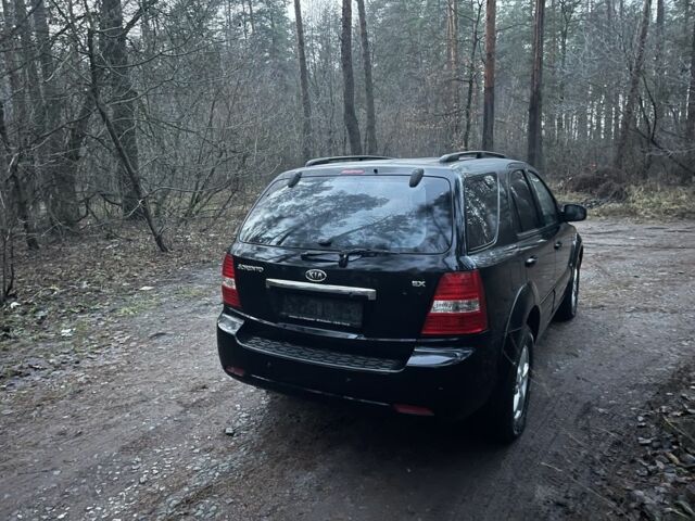 Черный Киа Соренто, объемом двигателя 2.5 л и пробегом 200 тыс. км за 5200 $, фото 7 на Automoto.ua