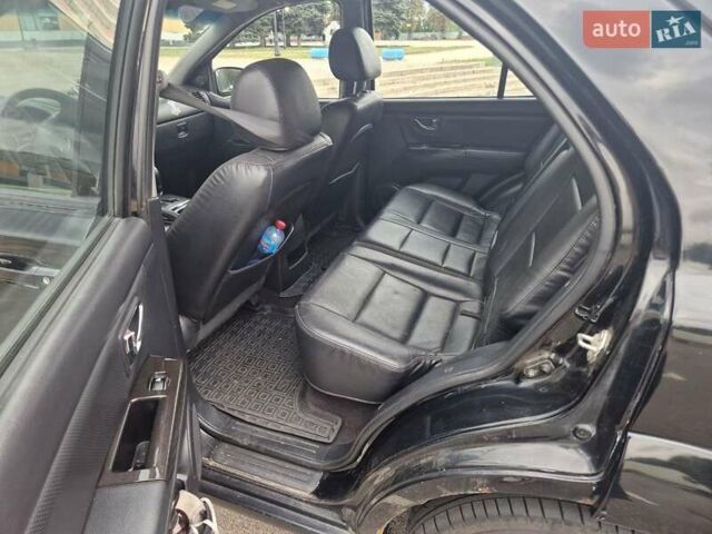 Черный Киа Соренто, объемом двигателя 2.5 л и пробегом 250 тыс. км за 6000 $, фото 4 на Automoto.ua