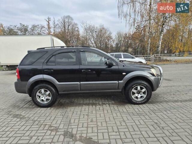 Черный Киа Соренто, объемом двигателя 2.5 л и пробегом 350 тыс. км за 3700 $, фото 7 на Automoto.ua