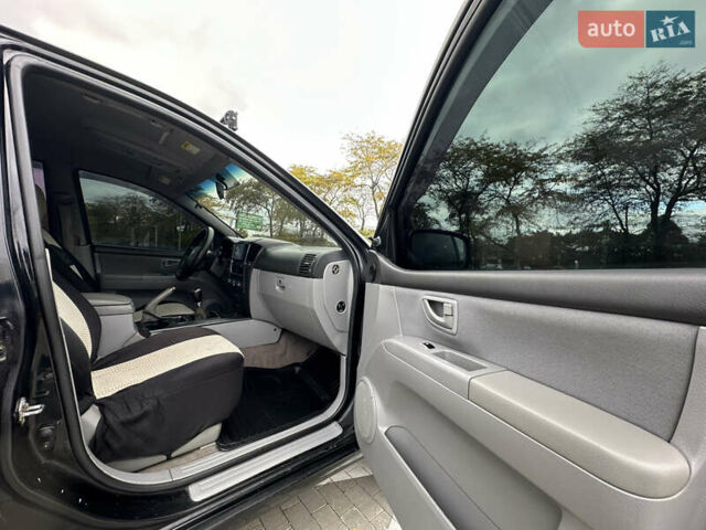 Черный Киа Соренто, объемом двигателя 2.5 л и пробегом 299 тыс. км за 5399 $, фото 27 на Automoto.ua