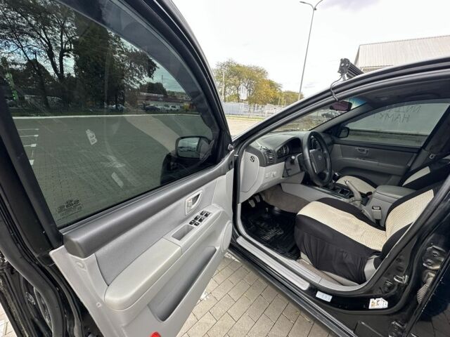 Черный Киа Соренто, объемом двигателя 2.5 л и пробегом 300 тыс. км за 5499 $, фото 16 на Automoto.ua