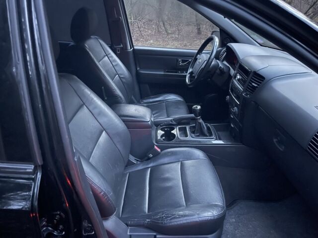 Черный Киа Соренто, объемом двигателя 2.5 л и пробегом 200 тыс. км за 5200 $, фото 9 на Automoto.ua