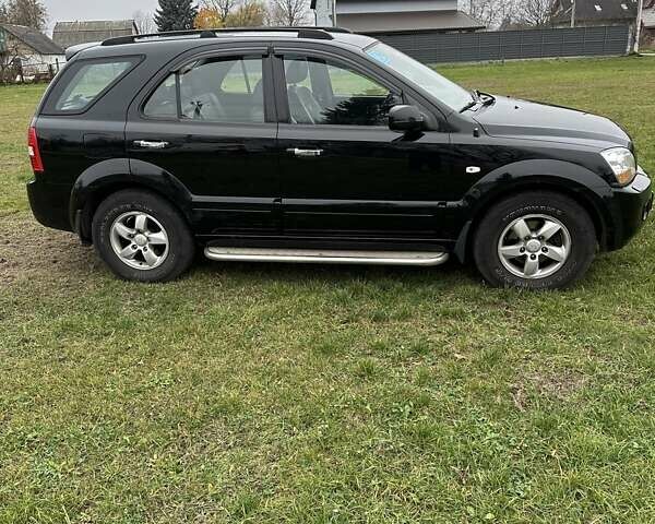 Черный Киа Соренто, объемом двигателя 2.5 л и пробегом 199 тыс. км за 10350 $, фото 5 на Automoto.ua