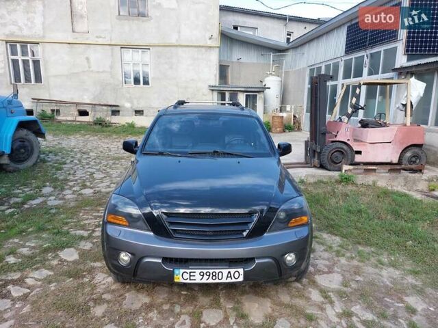 Черный Киа Соренто, объемом двигателя 2.5 л и пробегом 197 тыс. км за 10000 $, фото 7 на Automoto.ua